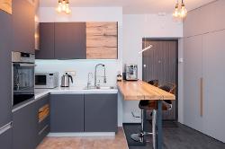 new kitchen diner in garage conversion with scaffold board breakfast bar